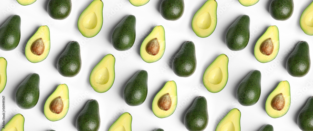 Flat lay composition with fresh ripe avocados on white background, banner design Flat lay composition with fresh ripe avocados on white background, banner design