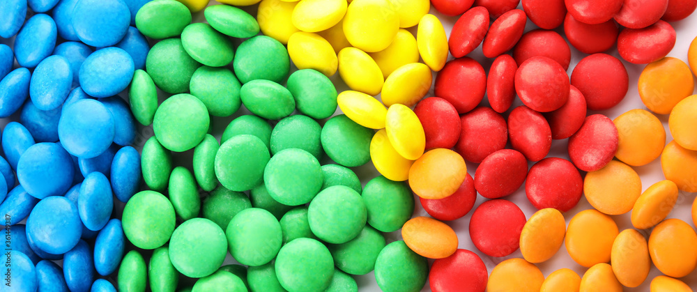 Many colorful candies as background, top view. Banner design Many colorful candies as background, top view. Banner design