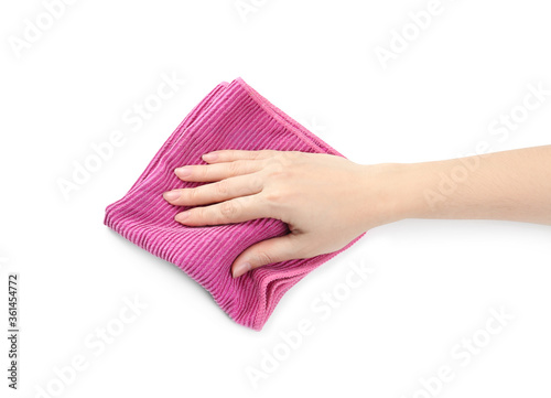 Woman with rag on white background, closeup of hand photo