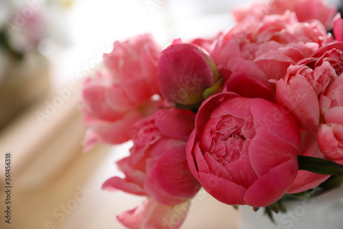 Beautiful peony bouquet on blurred background, closeup
