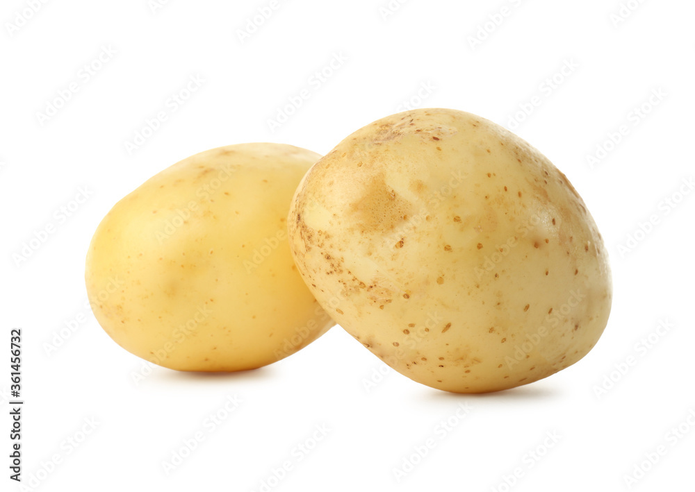 Fresh raw organic potatoes on white background