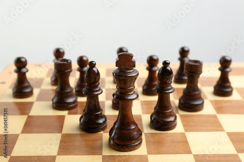 Chessboard with game pieces. Career promotion concept