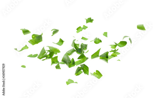 Cut fresh green parsley on white background
