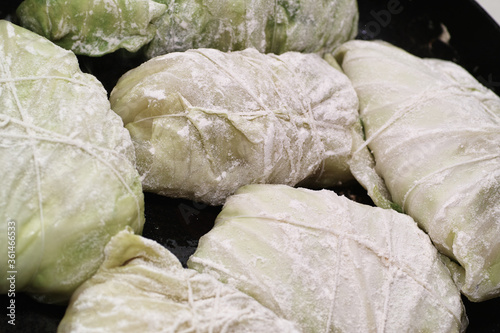 Preparing stuffed cabbage, Polish cuisine specialty.