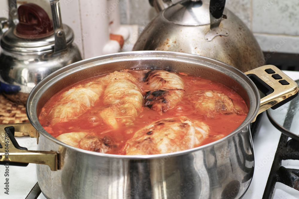 Preparing stuffed cabbage, Polish cuisine specialty. Preparing stuffed cabbage, Polish cuisine specialty.