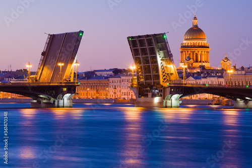 View of the divorced Annunciation bridge on a white night. Saint-Petersburg, Russia photo