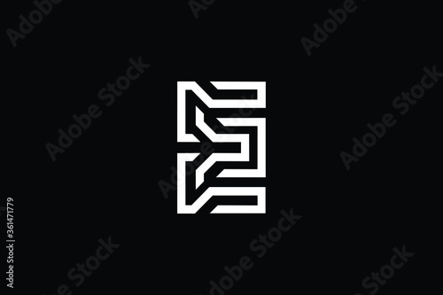 Minimal elegant monogram art logo. Outstanding professional trendy awesome artistic E EE initial based Alphabet icon logo. Premium Business logo White color on black background