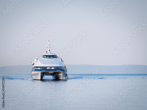 Catamaran ferry boat arrives at rab in croatia