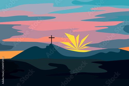 Mountain landscape at sunset with a cross