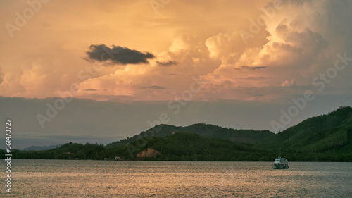 Beautiful landscape in Phuket with orange sky and mountaine at sunset