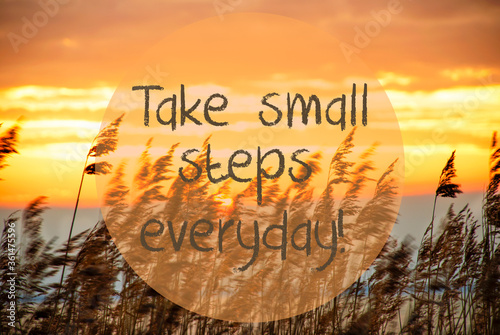English Quote Take Small Steps Everyday. Beach Grass At Sunrise Or Sunset In Background