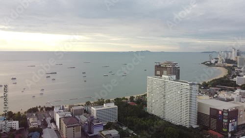 AERIAL Bang Sean Beach And Coastal City, Thailand During Sunrise photo