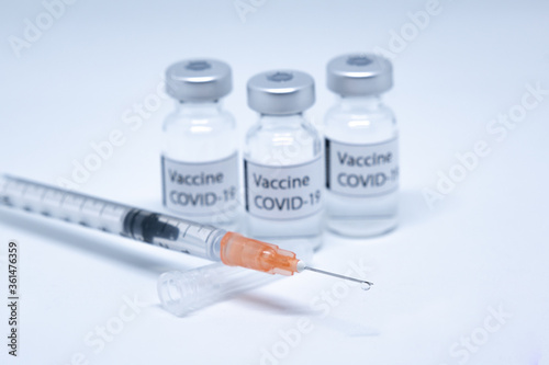 Covid-19 vaccine with syringe