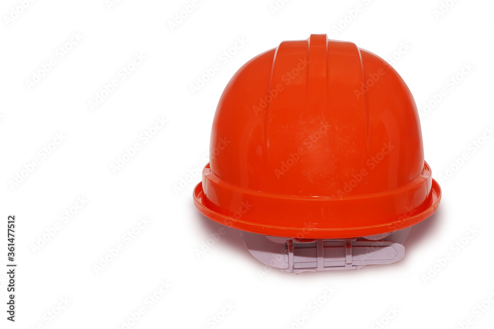 Fototapeta premium Red plastic safety helmet isolated on white background.