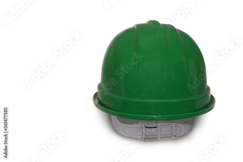 Green plastic safety helmet isolated on white background.