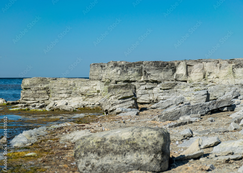summer landscape with limestone cliffs, Undva Cape, Tagamoisa Peninsula, Saaremaa Island, Estonia