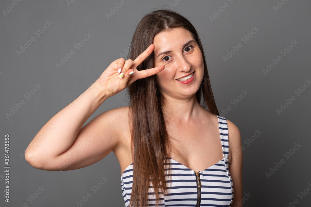Happy young woman in summer dress. Portrait of a smiling girl. Happy young woman in summer dress. Portrait of a smiling girl.