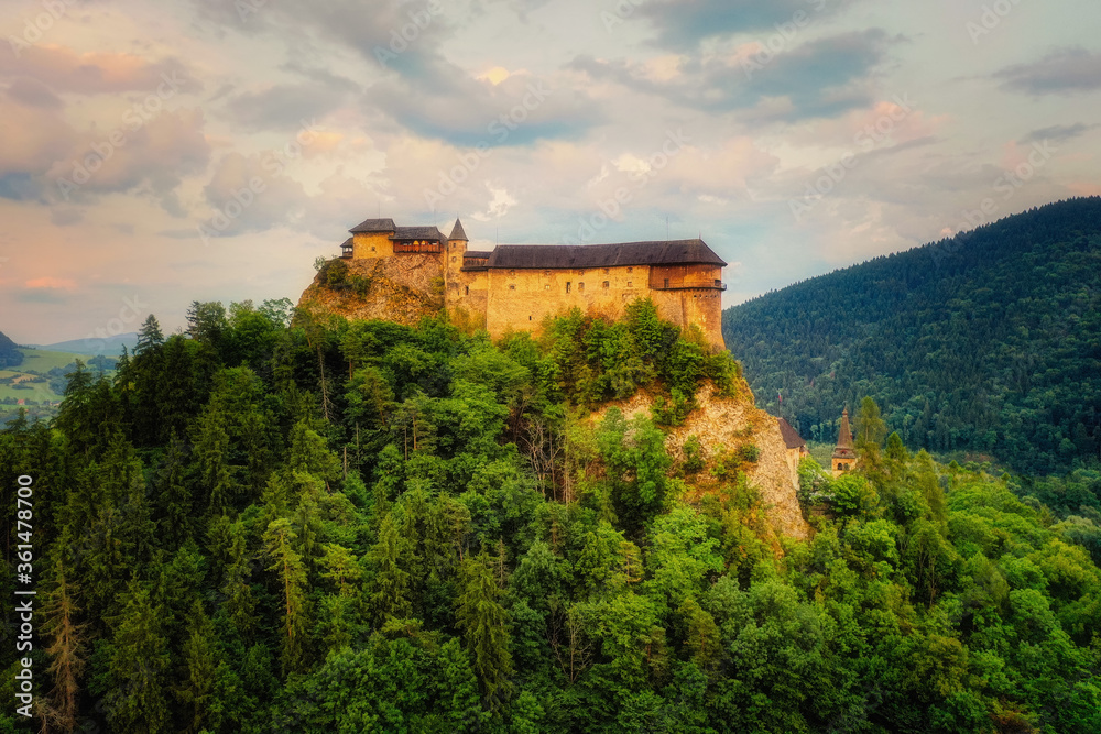 Orava Castle on a huge cliff above the river valley