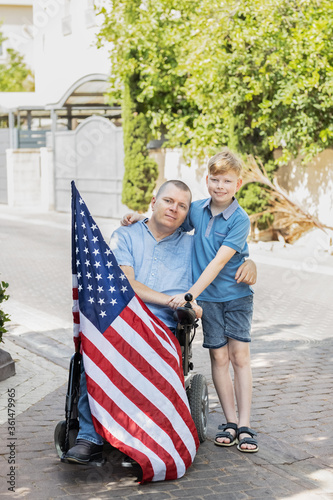 Father and Son with flag of USA