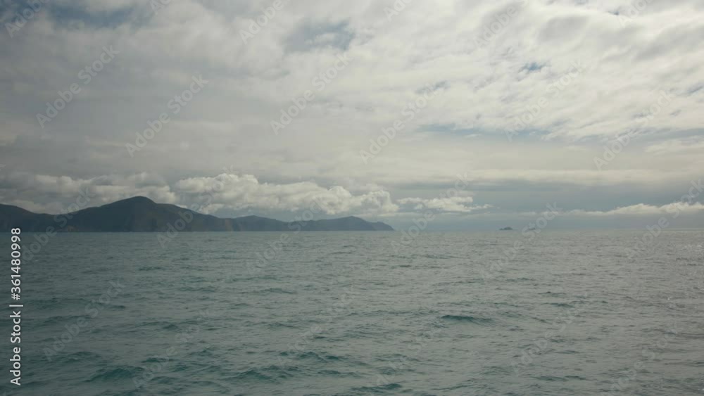 Ocean views from ferry ride between Wellington and Picton, New Zealand - land seen in distance Ocean views from ferry ride between Wellington and Picton, New Zealand - land seen in distance