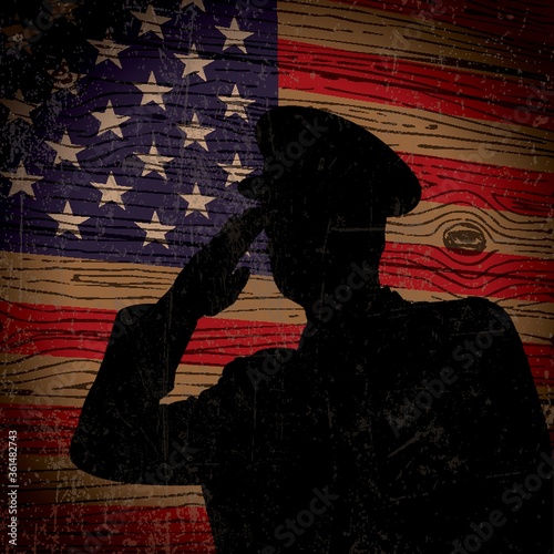Policeman saluting american flag