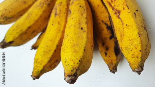 One comb of raja banana or pisang raja or Musa paradisiaca from AAB group. Isolated in white background