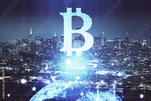 Multi exposure of cryptocurrency theme hologram drawing and city veiw background. Concept of blockchain and bitcoin.