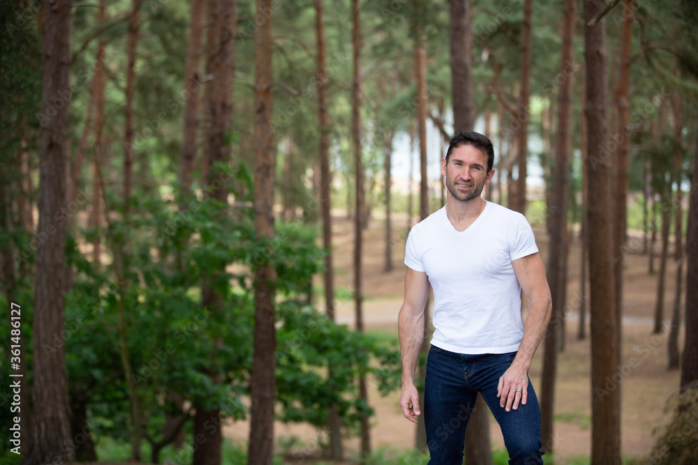 young man in the forest young man in the forest
