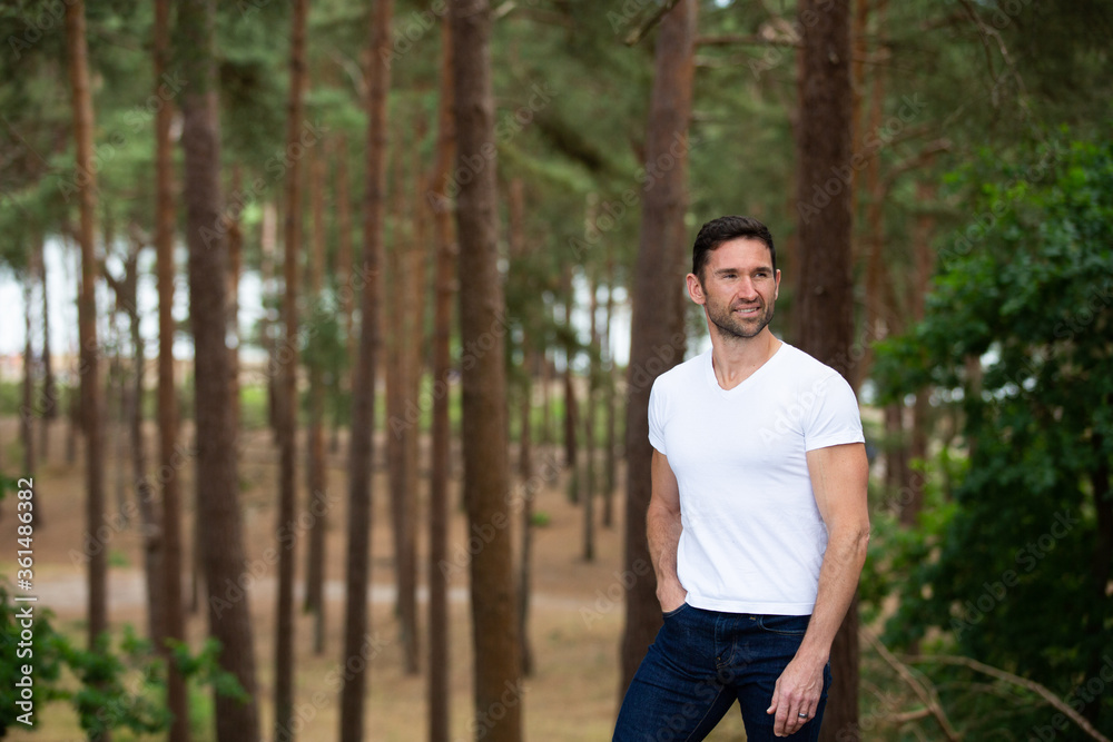 young man in the forest young man in the forest