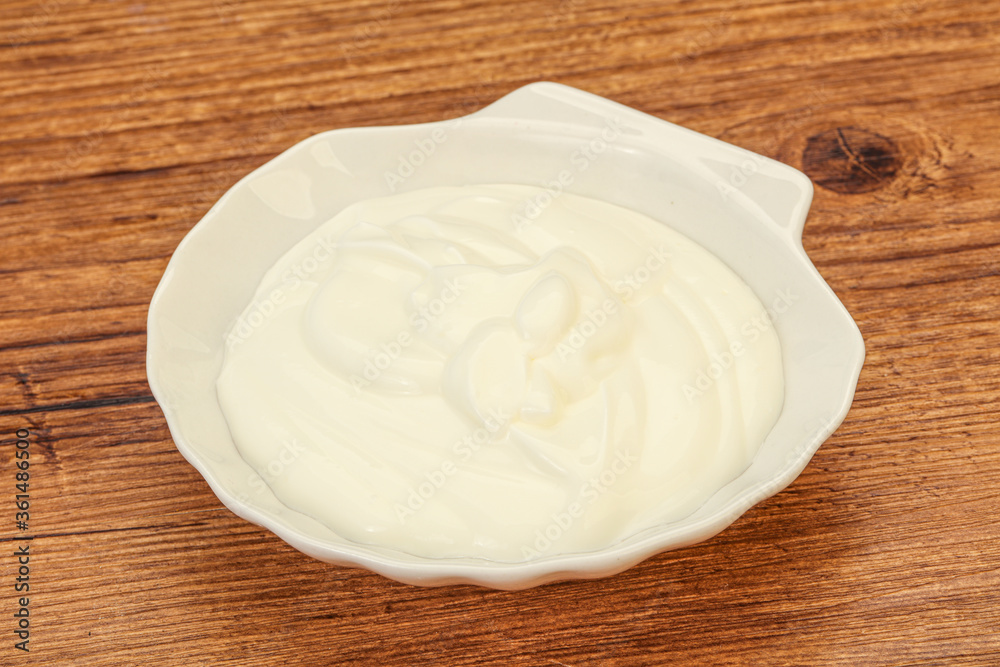 Sour cream in the bowl