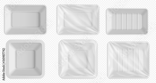 Plastic food tray. Styrofoam container for frozen food and fresh meat, fish, chicken. Empty food package with clear wrap isolated. Blank plastic tray template set on transparent background