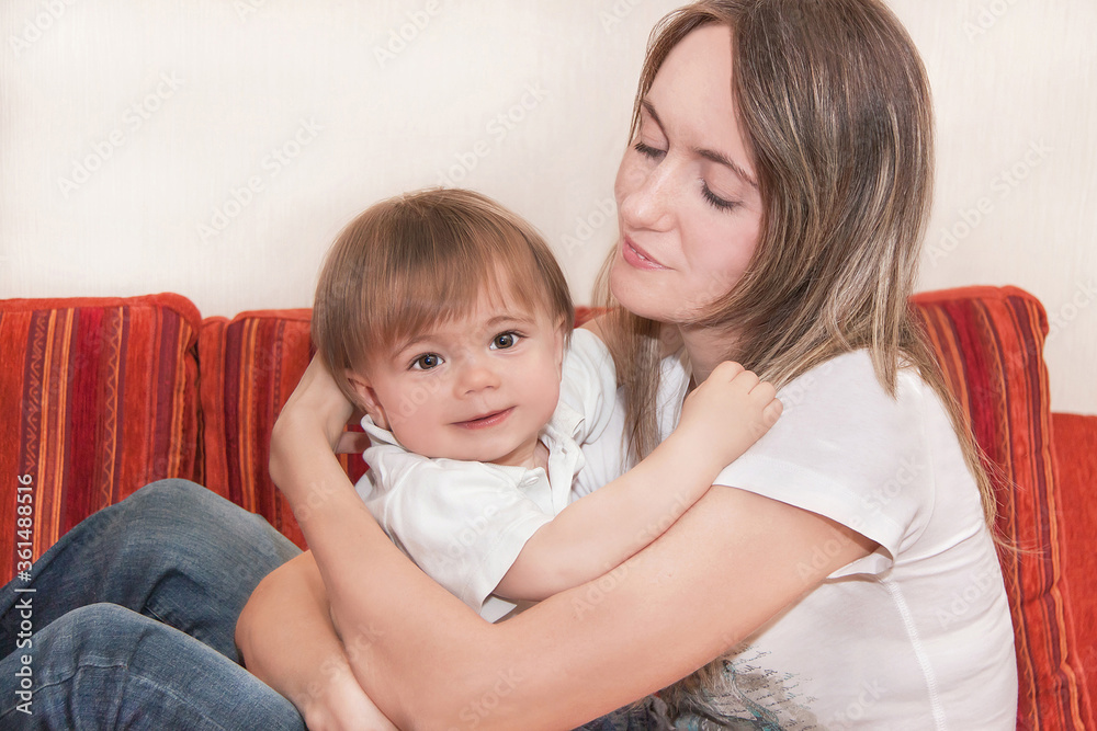 Happy mother with child at the home. Happy mother with child at the home.