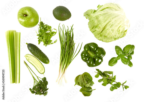 green vegetables, herbs and fruits isolated on white