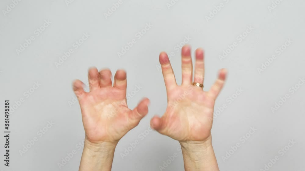 Hands of senior female opening and closing repeatedly in a rhythmic pattern signaling the ability to move pain free and without arthritis in the joints. Hands of senior female opening and closing repeatedly in a rhythmic pattern signaling the ability to move pain free and without arthritis in the joints.
