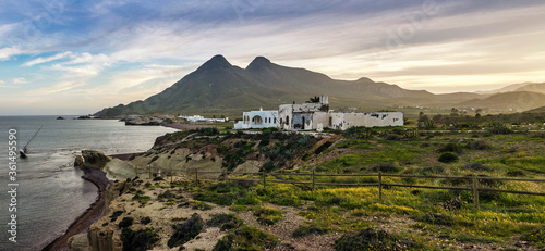 Panoramic view of a traditional Andalusian country house at sunset in Los Escullos, Cabo de Gata-Níjar Natural Park, Almeria province, Andalusia, Spain
