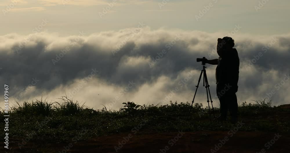 custom made wallpaper toronto digitalThe silhouette of Professional photographer and landscape at the clouds,Beautiful sunset above clouds,Morning mist