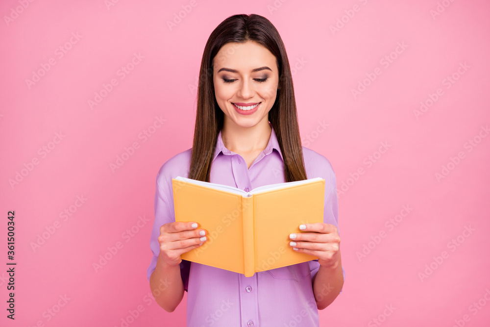 Close-up portrait of her she nice attractive lovely pretty lovable winsome cheerful cheery focused long-haired girl reading love story isolated on pink pastel color background Close-up portrait of her she nice attractive lovely pretty lovable winsome cheerful cheery focused long-haired girl reading love story isolated on pink pastel color background