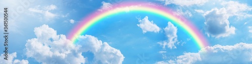 Rainbow in blue sky. © natara