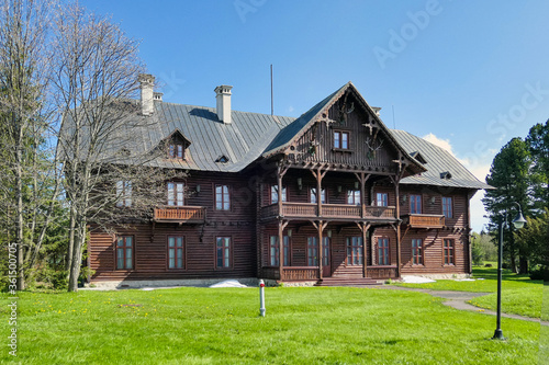 wooden old mansion in the picturesque countryside