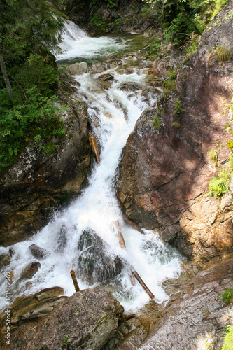Wodogrzmoty Mickiewicza waterfall in Tatra mountains on Roztoka Stream, Poland. photo