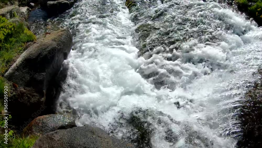 waterfall of Ayous lake in Ossau valley in the french Pyrenees waterfall of Ayous lake in Ossau valley in the french Pyrenees