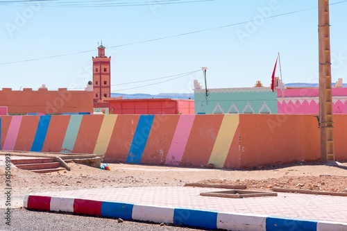 View of the top of colorful buildings and parapet photo