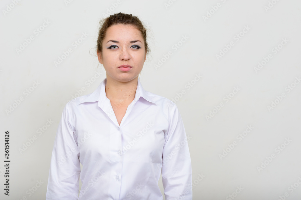 Portrait of young beautiful businesswoman looking at camera Portrait of young beautiful businesswoman looking at camera
