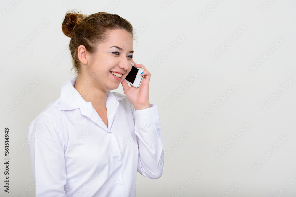 Portrait of happy young beautiful businesswoman talking on the phone Portrait of happy young beautiful businesswoman talking on the phone