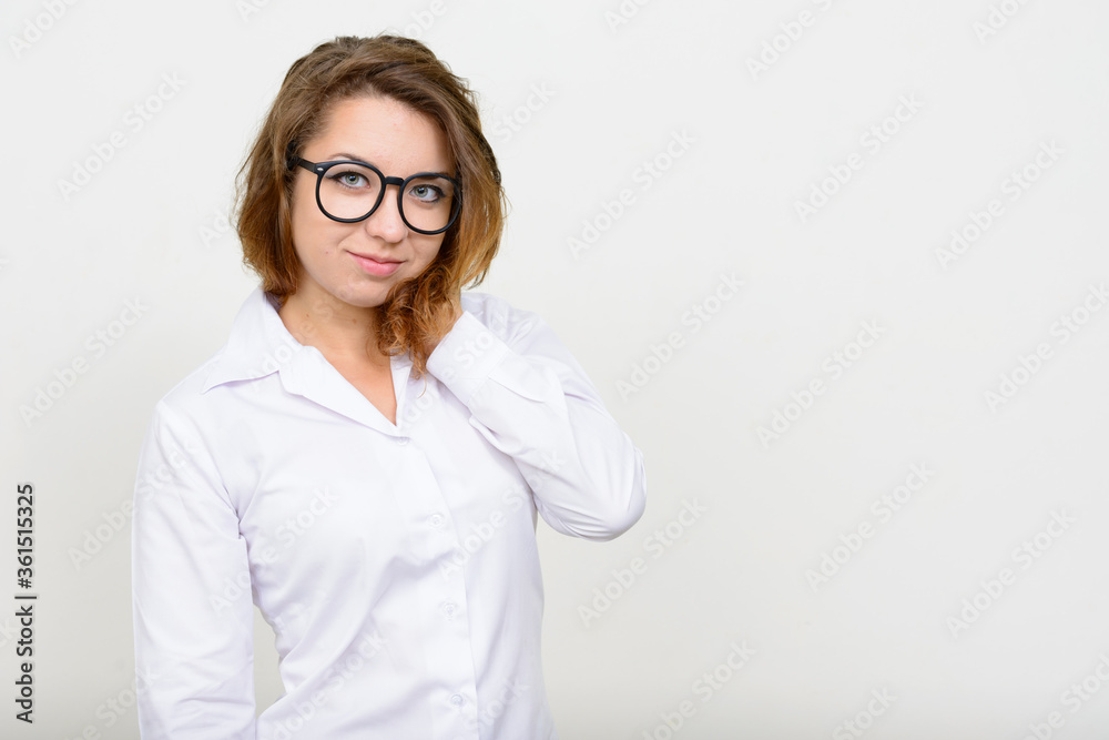 Portrait of young beautiful businesswoman with eyeglasses
