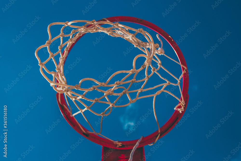 basketball hoop in the blue sky