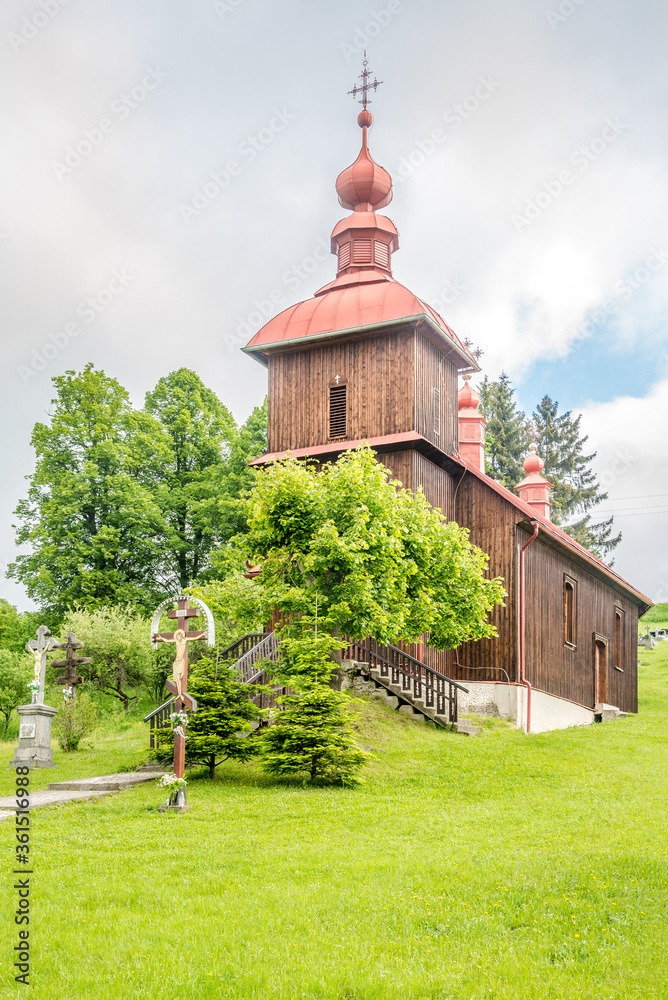 Fototapeta premium View at the Wooden church of Protection of the Blessed Virgin in Varadka, Slovakia