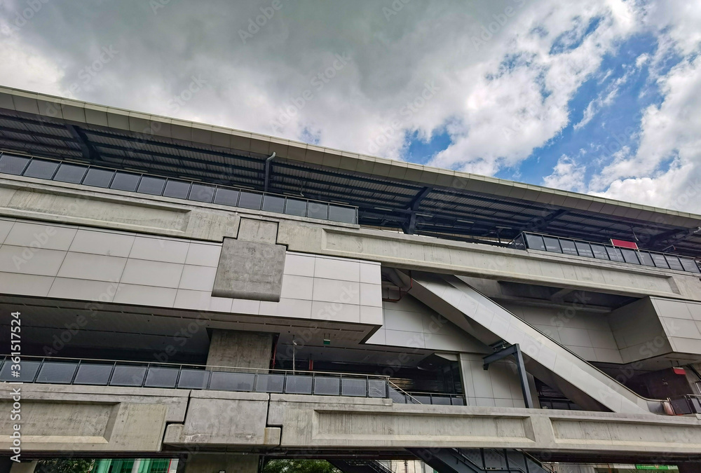 Architecture construction of elevator, escalator stairs and sky walk way, walk bridge between sky train station and department store mall Architecture construction of elevator, escalator stairs and sky walk way, walk bridge between sky train station and department store mall