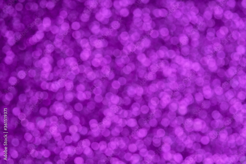 Festive violet pattern background. Holiday glowing party decoration. Magic illuminated lights. Glittering surface with glow effect. Bokeh defocused light for overlay effect. Blurred defocused lights Festive violet pattern background. Holiday glowing party decoration. Magic illuminated lights. Glittering surface with glow effect. Bokeh defocused light for overlay effect. Blurred defocused lights