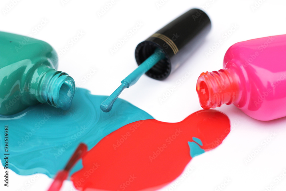 Spilled Nail Polish on White Background Pink and Green Spilled Nail Polish on White Background Pink and Green